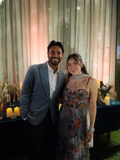 A couple dressed for an evening celebration